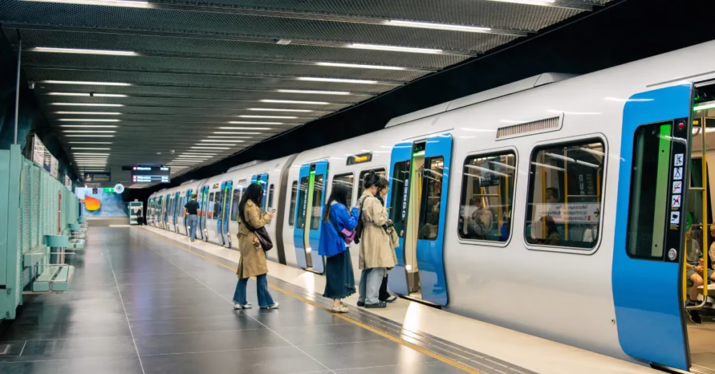 Barcelona budget travel tips – tourist using metro and enjoying local tapas menu del dia