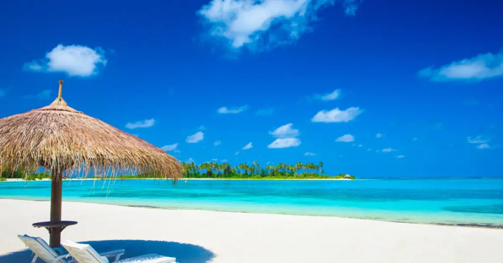 Best time to visit Maldives – aerial view of Maldives islands and turquoise lagoons.