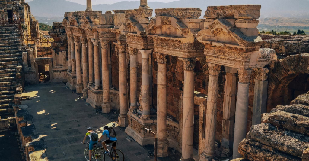 Cycling through ancient ruins in Polonnaruwa during Sri Lanka adventure travel.