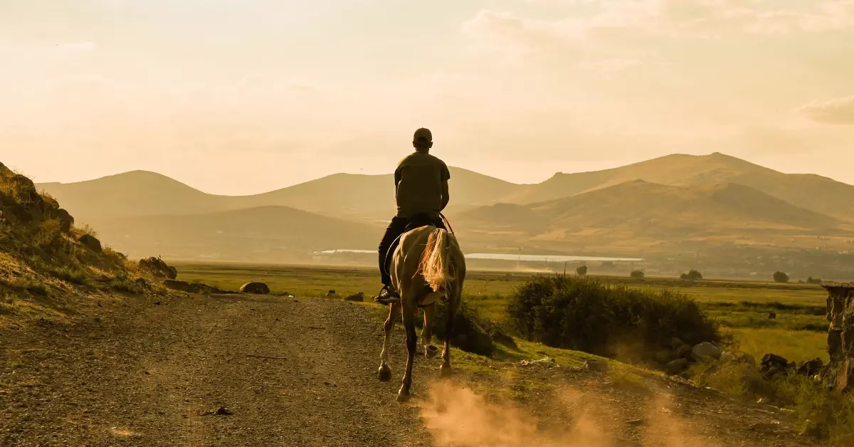 Horseback adventure across the Mongolian steppe during Mongolia adventure travel.