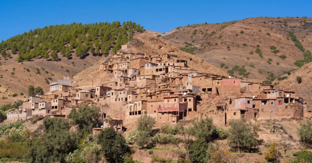 Trekking through the Atlas Mountains during Morocco adventure travel.
