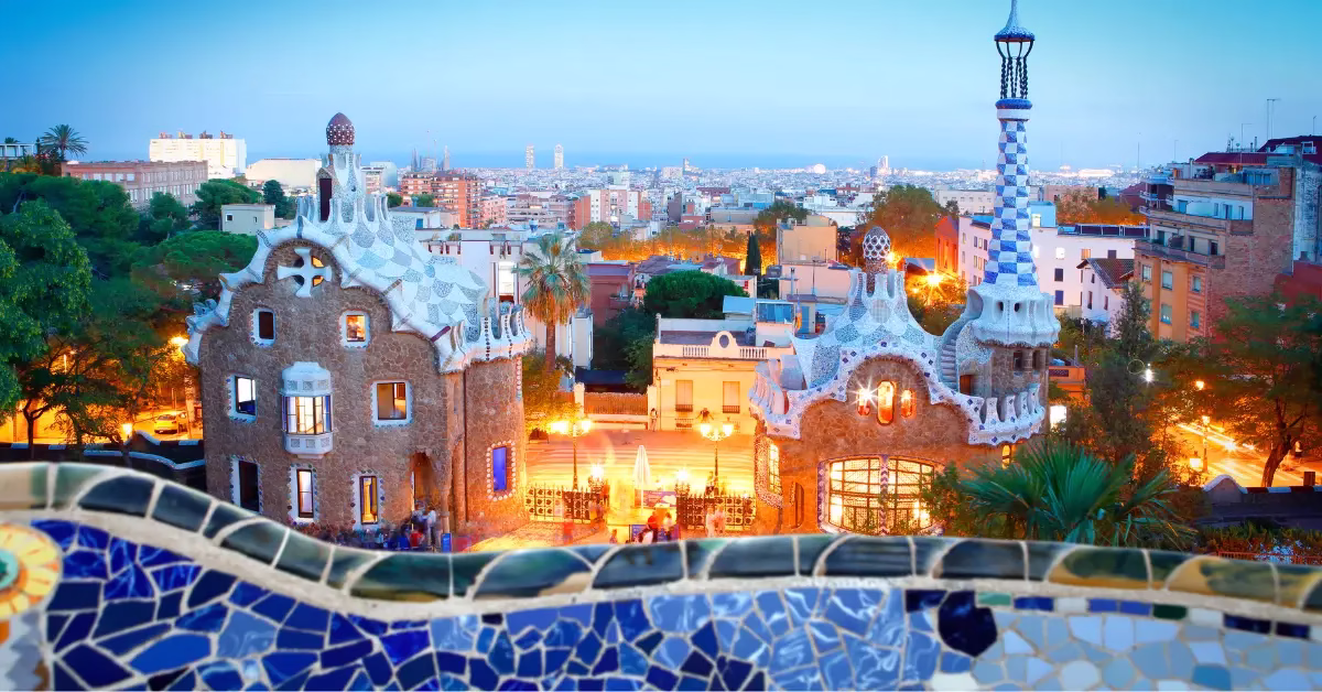 Traveler overlooking Park Güell at sunrise – Spain travel guide hero image.